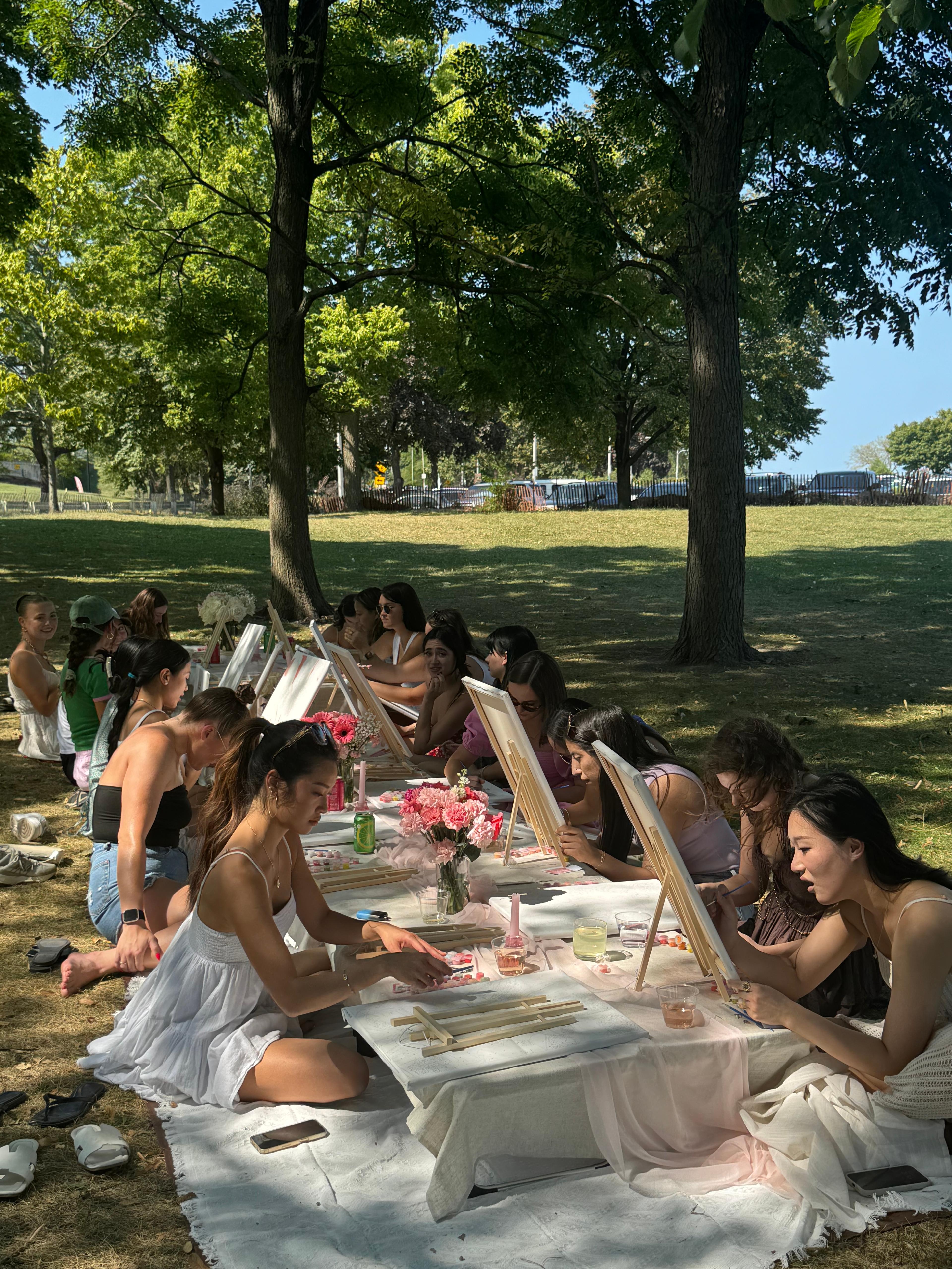 Girl Dinner Social attendees gathered at an outdoor event